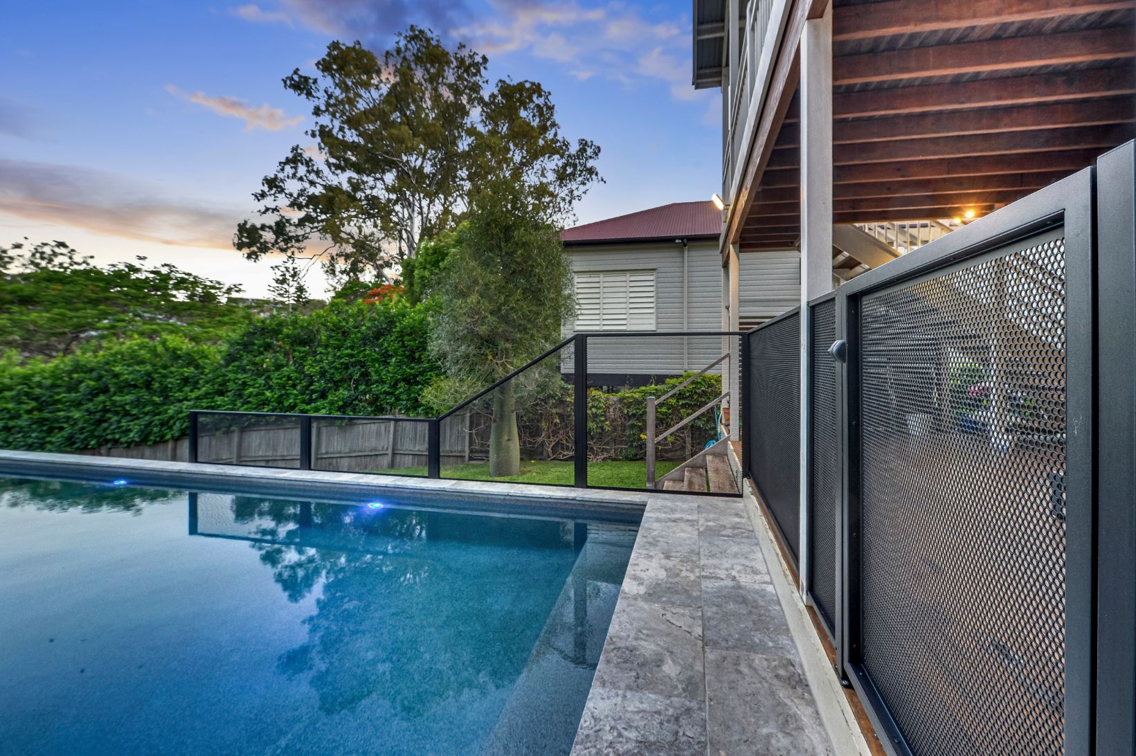 Infinity pool edge fencing in matt black, Queensland