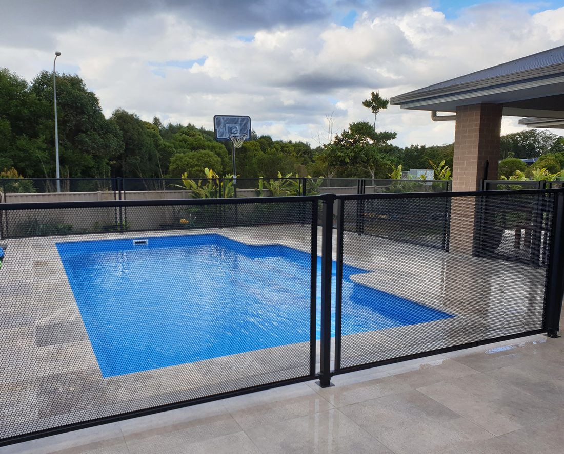 Pure Perf pool fencing in Textured Black around a Gold Coast backyard pool